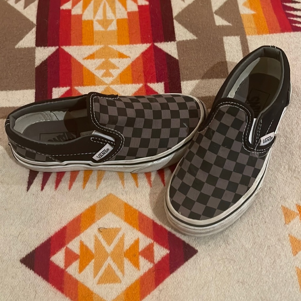 Little kids slip on checkerboard Vans